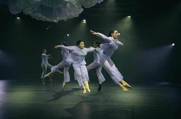 A scene from the second half of the program, showing the students' choreographic response. Photo by Gregory Lorenzutti.