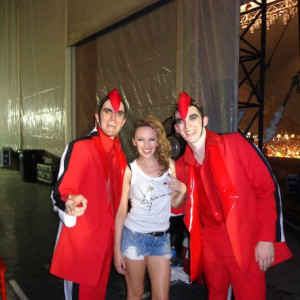 Charles Bartley (right) with Kylie and Jesse Rasmussen backstage at a corporate event in Dubai.