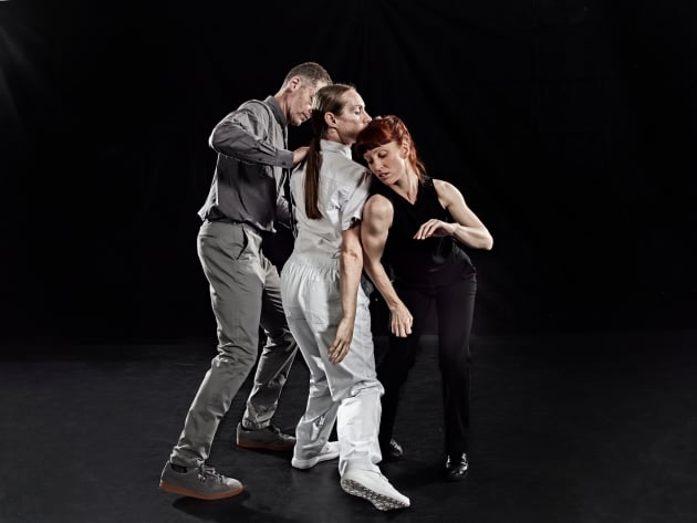 Black threads herself through the tight angles created by White, while Grey both commentates on the action and at times inserts himself into their duets. Photo: Chris Herzfeld, Camlight Productions.