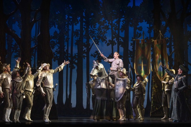 Ainsley Melham as Topher (the Prince) and ensemble.