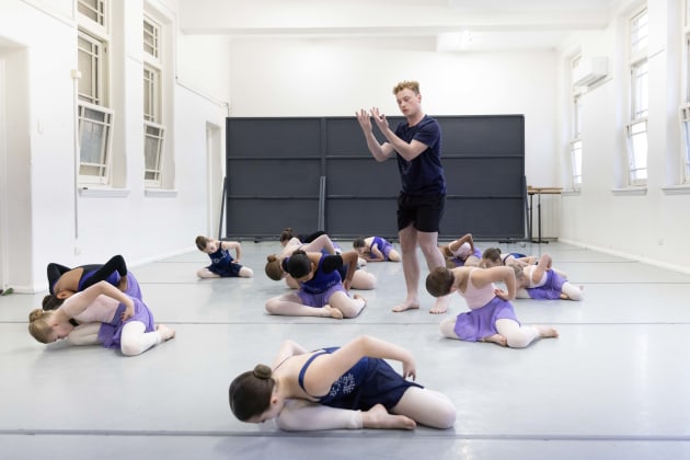 Blake Escott takes class at Yurali Ballet Ensemble. Photo by Noni Carroll.