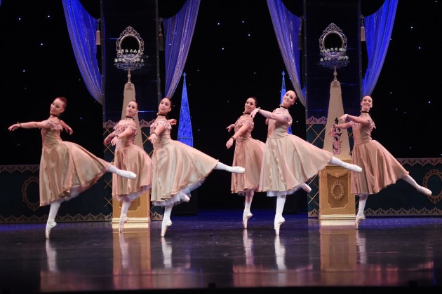 The ensemble corps de ballet at the ball.