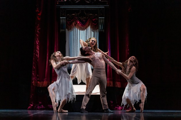 Oscar Vald&eacute;s as Jonathan Harker with Alexa Tuzil, Glenda Garcia Gomez and Claire Voss as the Vampire Brides in Dracula, West Australian Ballet. Photo: Bradbury Photography.