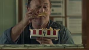 A janitor teases students with chips for KFC