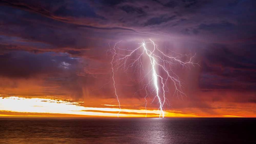 Sunset-lit lightning over Gulf St Vincent, SA &copy; Rowland Beardsell