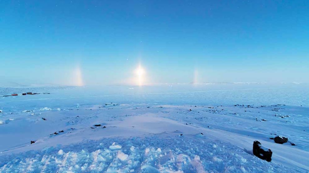Diamond dust, partial 22&deg; halo and light pillar over Prydz Bay, &copy; Aaron Stanley, APS Photography