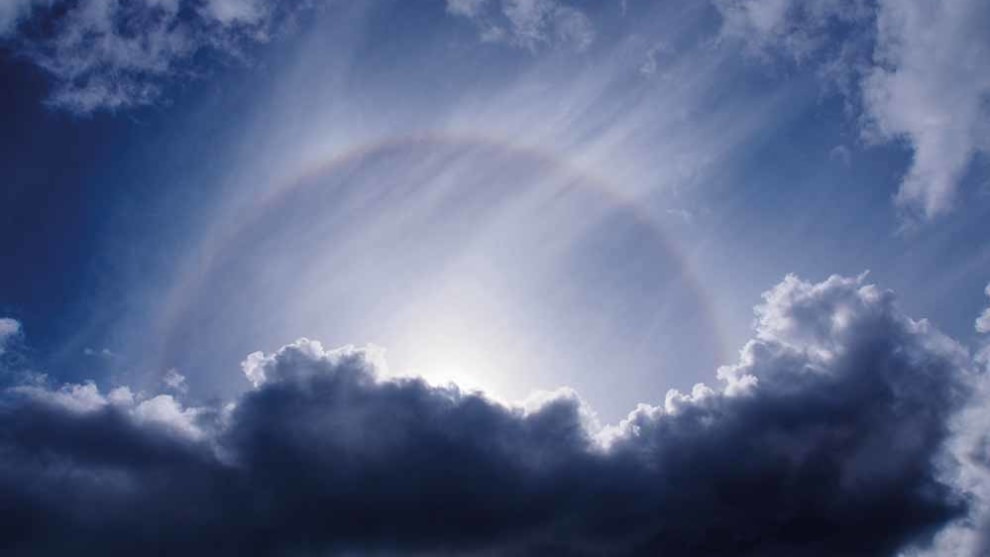 Halo seen from Bathurst Harbour, Melaluca, Tasmanian Wilderness World Heritage Area, TA &copy; Bob Brown