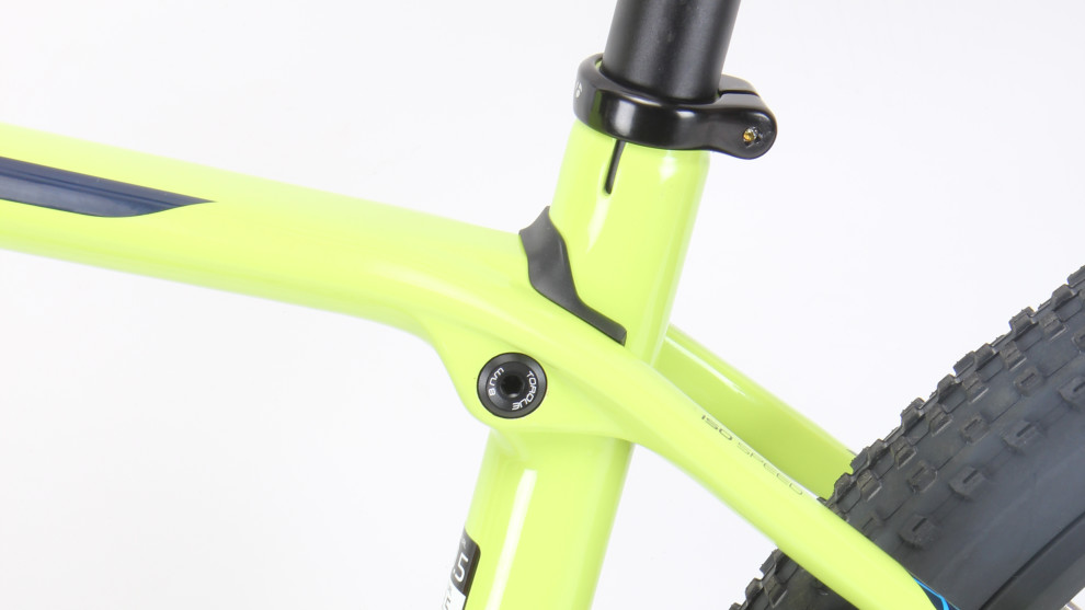 The top tube decoupler allows the entire seat tube to flex.