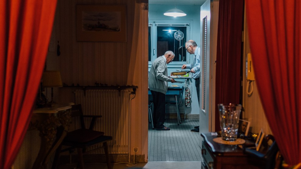 Food for the Family. Guillaume Flandre, UK. Family Dinner. This is the last time my father and grandfather cooked together in his apartment before my grandfather passed away. I captured this scene on Christmas Eve, a moment when, traditionally, the whole family would gather to share a meal.