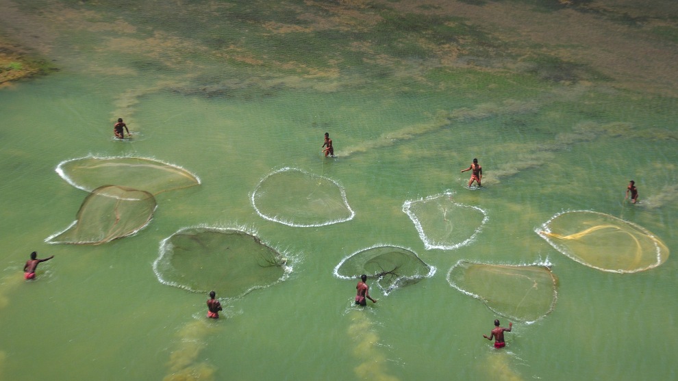 Bring Home the Harvest.	Debdatta Chakraborty, India. The Fishermen	Silabati is a perennial river, only getting inundated when water is released from the nearby dam, Medinipur, West Bengal. Villagers try their luck for their silver catch on one such occassion.