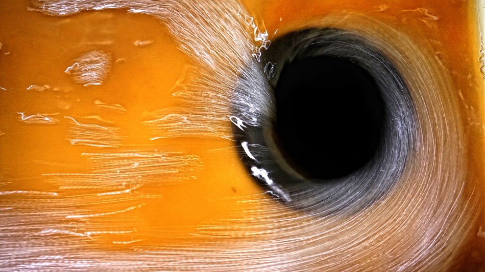 Errazuriz Wine Photographer of the Year - Overall Winner. Victor Pugatschew, Australia. Spinning the Chardonnay.	Here we have chardonnay being pressed at Champagne Veuve Fourny and the juice flowing into the Belon tanks for splitting of the fractions.
