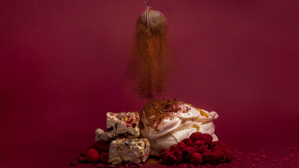 15-17 Years. William Lindsay-Perez, UK. Finishing Touches. A sprinkle of cocoa powder over raspberry meringue with a white chocolate rocky road. In this image, I wanted to combine rich colour and movement to create an image that looks as good as the dessert tasted.