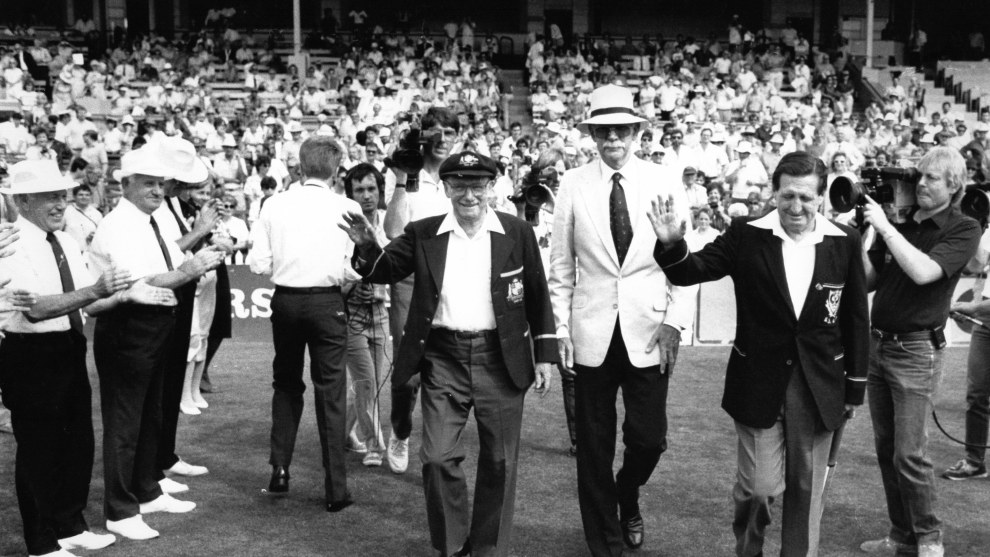 Bradman and Les Favell exiting the Adelaide Oval April 5, 1987, during a testimonial match for the ailing Les Favell.