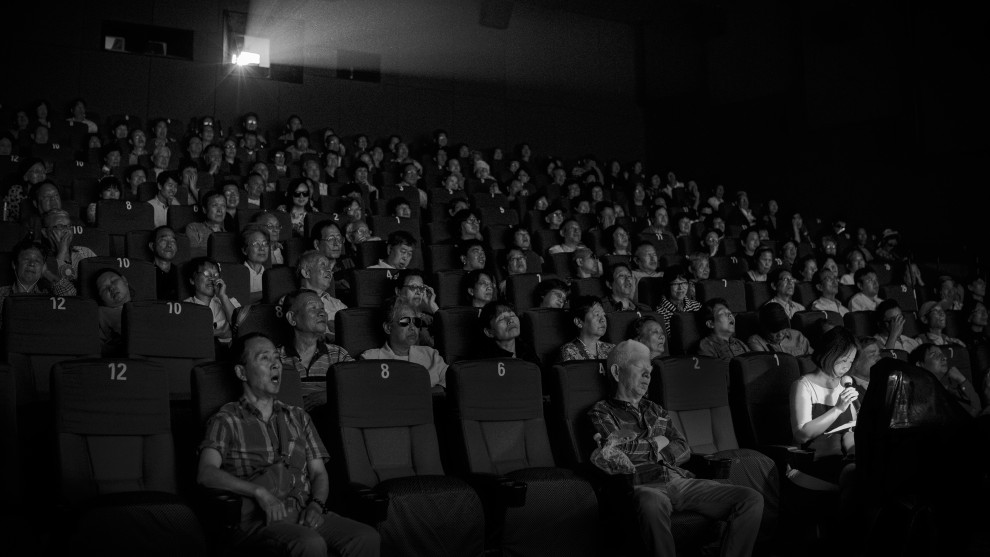 Photographer: Yi Han, USA

"This picture captures the moment when a group of blind and visually impaired people 'watching' a film in a theatre in Shanghai. There are 18 million blind and visually impaired people in China. The country is estimated to have the largest number of blind people in the world. Audio description service is not yet available nor common in this country. For blind people, watching movie is an impossible dream."