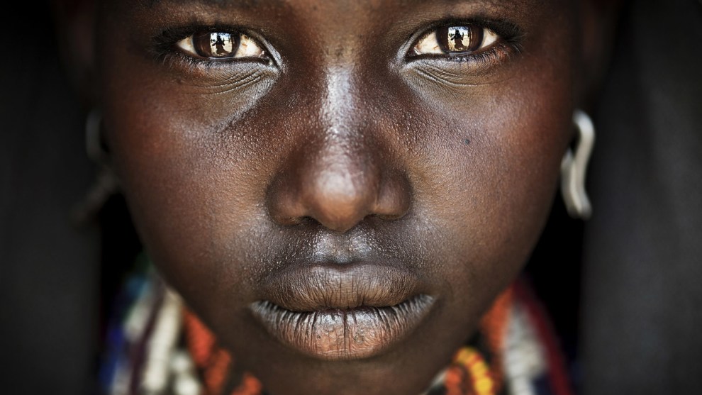 MATJAZ KRIVIC, SLOVENIA - WINNER, TRAVEL PORTFOLIO. Omo Valley,
Ethiopia
South Ethiopia,
Arbore village.
Onno, a teenage
girl from the
Arbore tribe. Canon EOS 5D
MkII, 100mm lens,
f2.8, 1/320s, ISO
400.