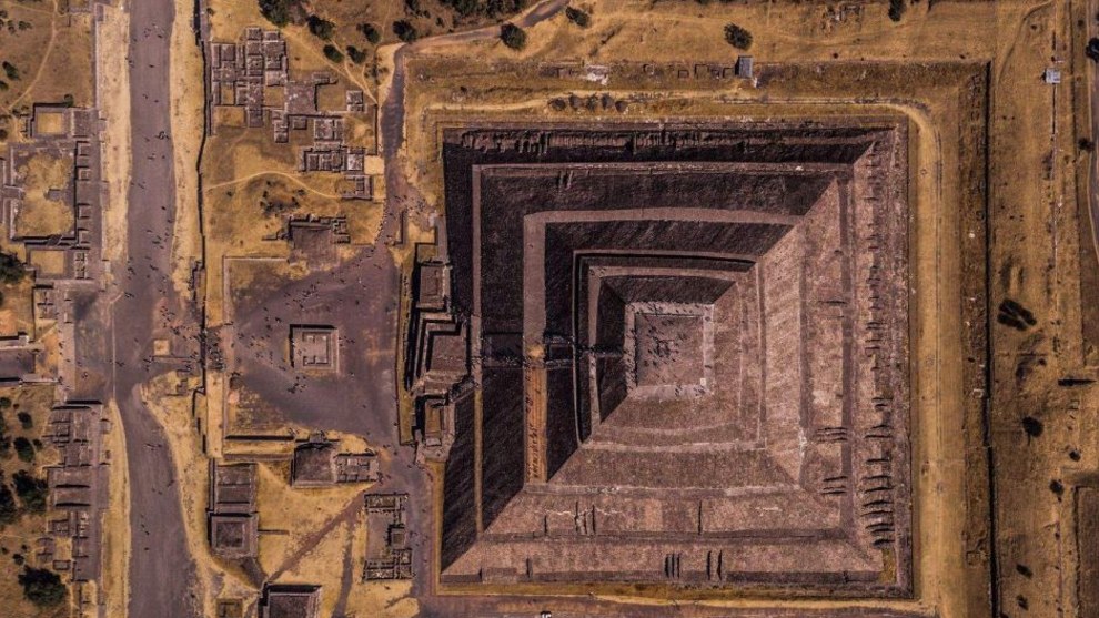 Geometry of the Sun. Teotihuacan means "the place where the gods were created," and that's the feeling once you visit this archaeological site of Mexico. This pyramid, the third-largest of Earth, was dedicated to the god of Sun, and its geometrical perfection can only inspire admiration for the civilization that build it. The grandeur of this behemoth is even greater compared with those tiny dots of humanity in the frame. Seemingly insignificant, but in the end also the makers of this wonder. Second place, Cities category. National Geographic Travel Photographer of the Year Contest. CREDIT: Photo and Caption by Enrico Pescantini/ National Geographic Travel Photographer of the Year Contest.