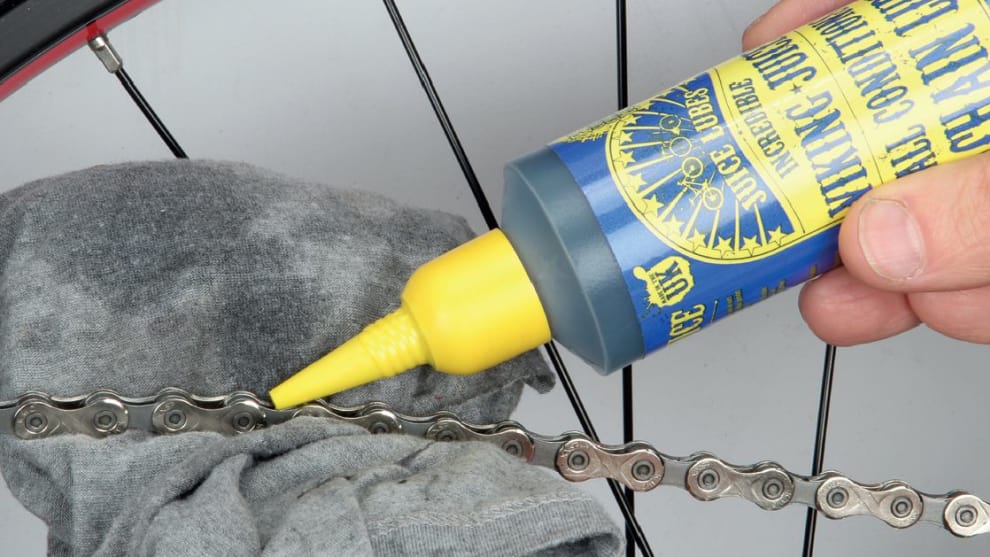 A quick clean; apply lube to loosen any gunk and thoroughly wipe the chain over.