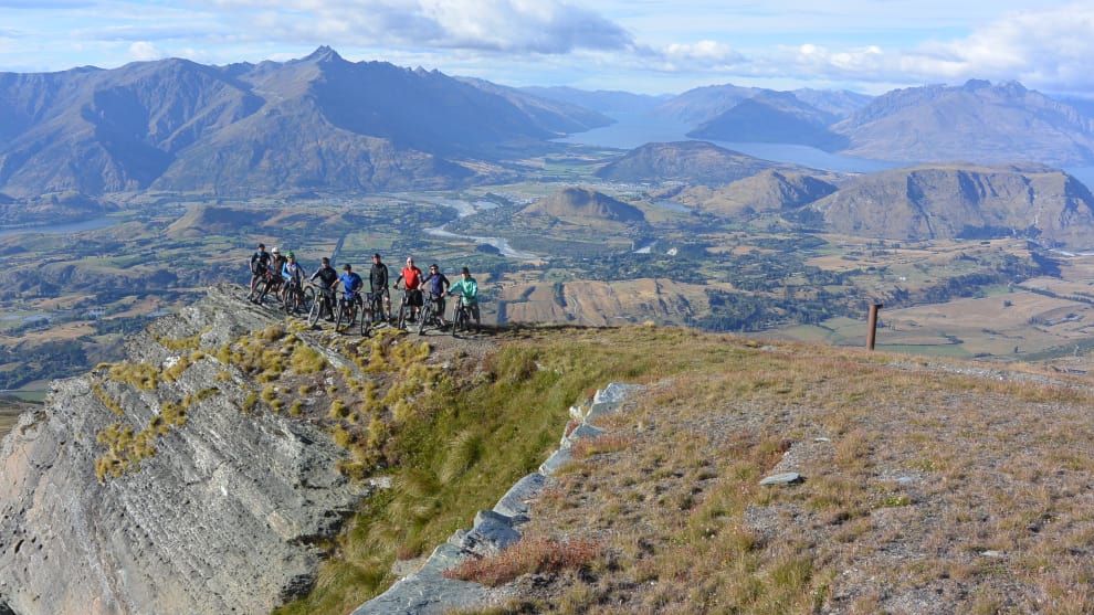 Only 1,100 metres of vertical descent to go&mdash;our crew at the top of Coronet Peak.