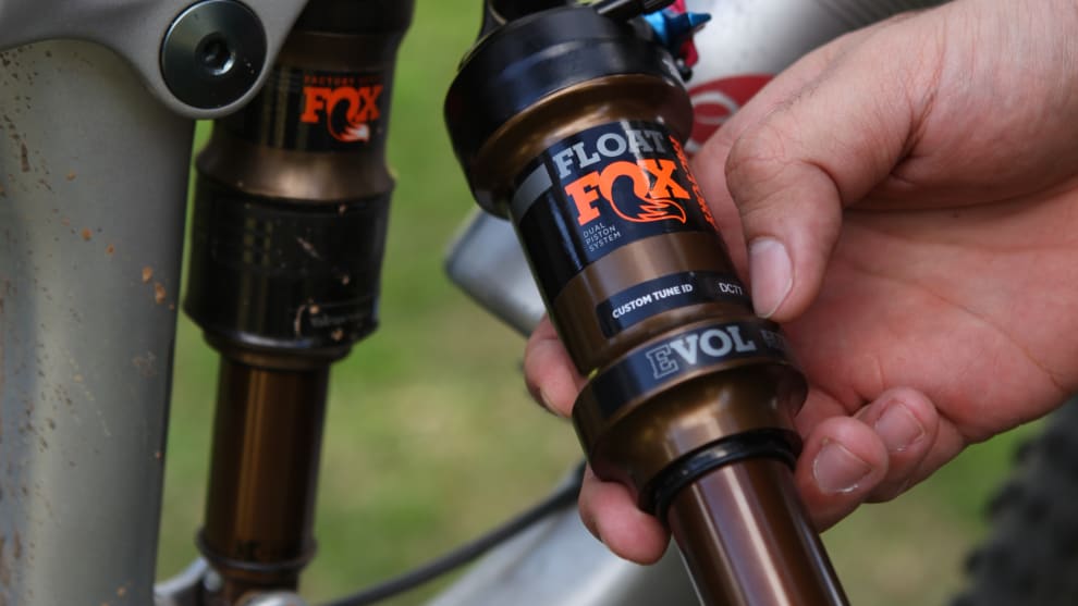 Out with the old and in with the new - the new DPS rear shocks (foreground) are easily identified by the bulbous negative air chamber on the one-piece air can.