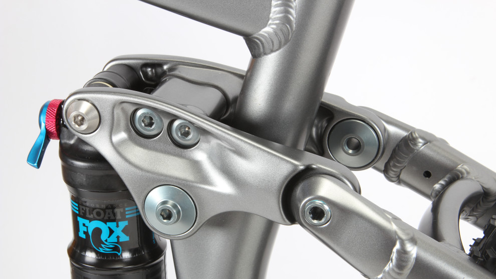 The main rocker link is a three piece bolt together affair &mdash; Norco has found this design to be stiffer than the one-piece welded setup.