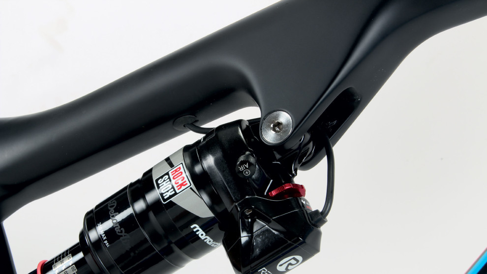 The extra box on the Monarch shock is the servo that adjusts the damper settings as you ride.