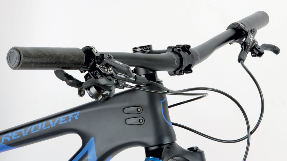 Wide bars and a short stem; not your traditional XC race setup but it works on the Revolver.