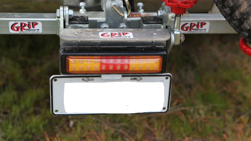 The optional LED number plate mount is a handy addition. Loosening the red knob on the right allows the rack to tilt.