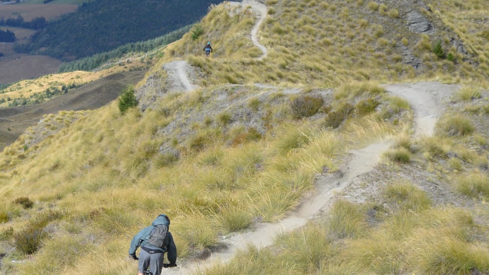 Winding down an exposed ridgeline, Rude Rock is an amazing trail&mdash;just watch out for the wind if you like to get your wheels off the ground.