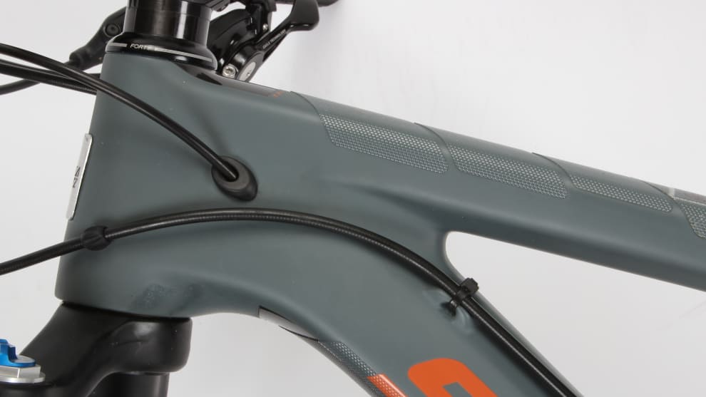 The rear brake hose is routed down the left side of the down tube. It's not ideal if you run the rear brake on the left; add some protective tape to the head tube to avoid rubbing.