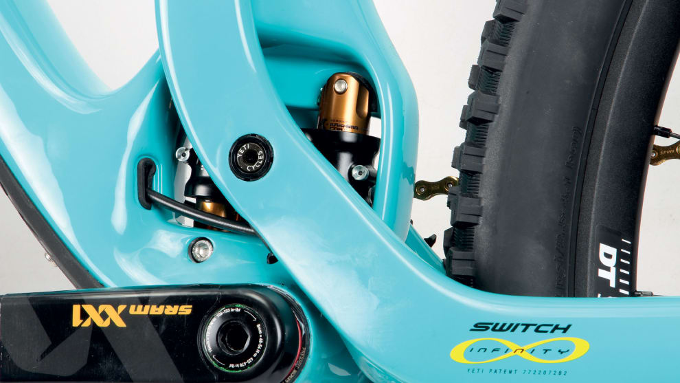 Yeti's Switch Infinity link leaves many confused but it's actually a really simple design. Grease ports allow for easy servicing but the small cable exit points make the internal routing relatively fiddly.