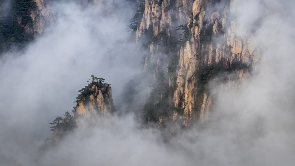Huangshan mountains, China. There is no rest at places like this, you have to be out for sunrise and sunset as atmospheric conditions can change quickly at any time. This was taken mid-afternoon, when I was out doing a recce for the evening shoot. Canon 1D X MkII, Canon 70-200mm lens @ 200mm, 1/250 @ f9, ISO 200.