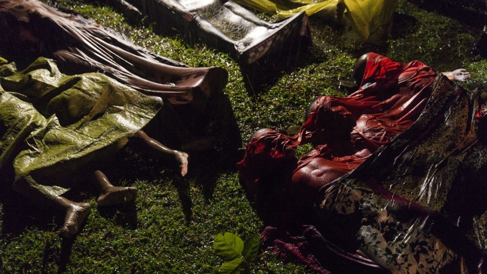 Rohingya Crisis. World Press Photo of the Year Nominee. &copy; Patrick Brown. The bodies of Rohingya refugees are laid out after the boat in which they were attempting to flee Myanmar capsized about eight kilometers off Inani Beach, near Cox's Bazar, Bangladesh. Around 100 people were on the boat before it capsized. There were 17 survivors. The Rohingya are a predominantly Muslim minority group in Rakhine State, western Myanmar. They number around one million people, but laws passed in the 1980s effectively deprived them of Myanmar citizenship. Violence erupted in Myanmar on 25 August after a faction of Rohingya militants attacked police posts, killing 12 members of the Myanmar security forces. Myanmar authorities, in places supported by groups of Buddhists, launched a crackdown, attacking Rohingya villages and burning houses. 
Commissioned by Panos Pictures, for UNICEF.
