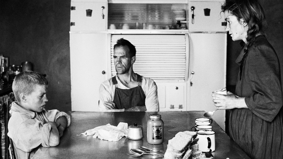 David Goldblatt, A plot-holder, his wife and their eldest son at lunch,
Wheatlands, Randfontein. September 1962 (3_4907),1962. Image courtesy the artist and Goodman Gallery, Johannesburg &copy; the artist
