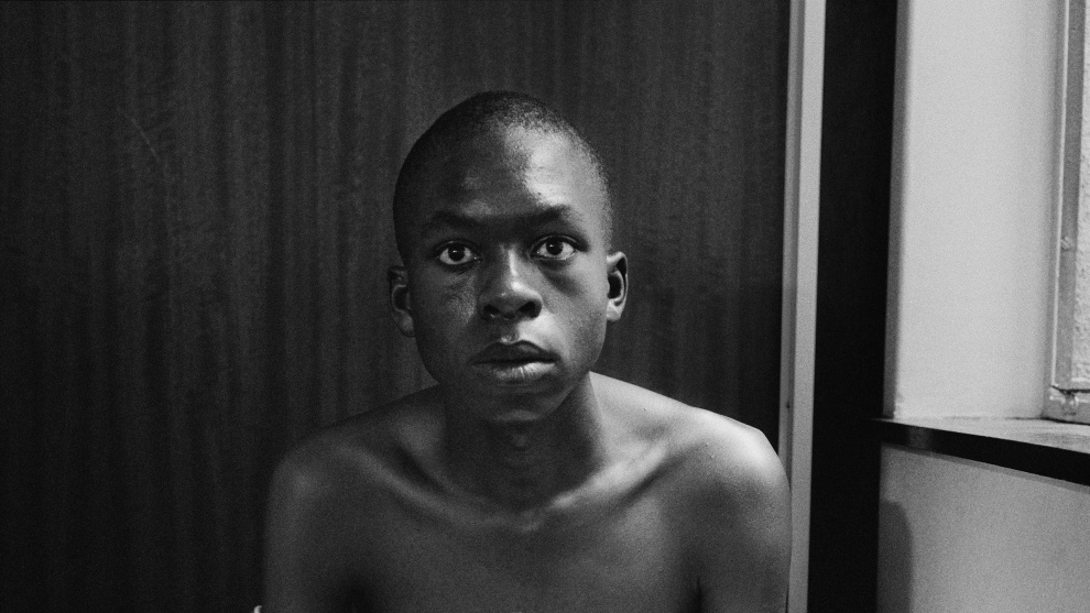 David Goldblatt, Fifteen-year old Lawrence Matjee after his assault and detention by the Security Police, Khotso House, de Villiers Street (2_31686),1985. Image courtesy the artist and Goodman Gallery, Johannesburg &copy; the artist