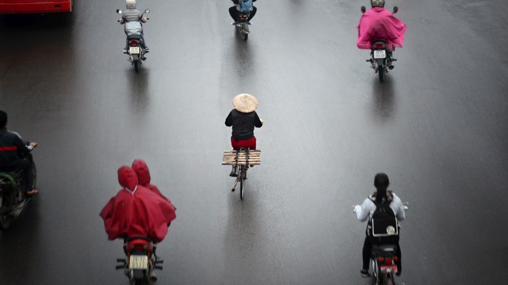 Commuters on the streets of Hanoi, Vietnam.