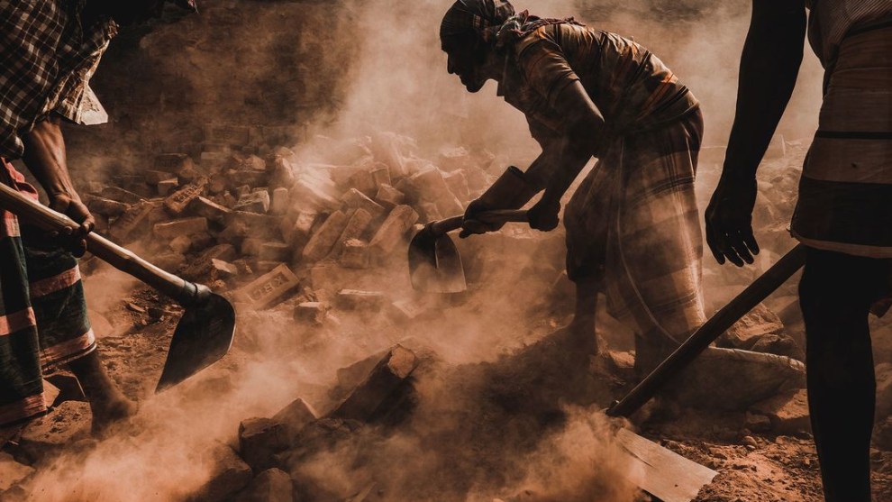 &copy; Drew Hoper. People (Finalist). Extreme Conditions. Brick factory laborers working under extreme conditions in a brick factory in Dhaka, Bangladesh.