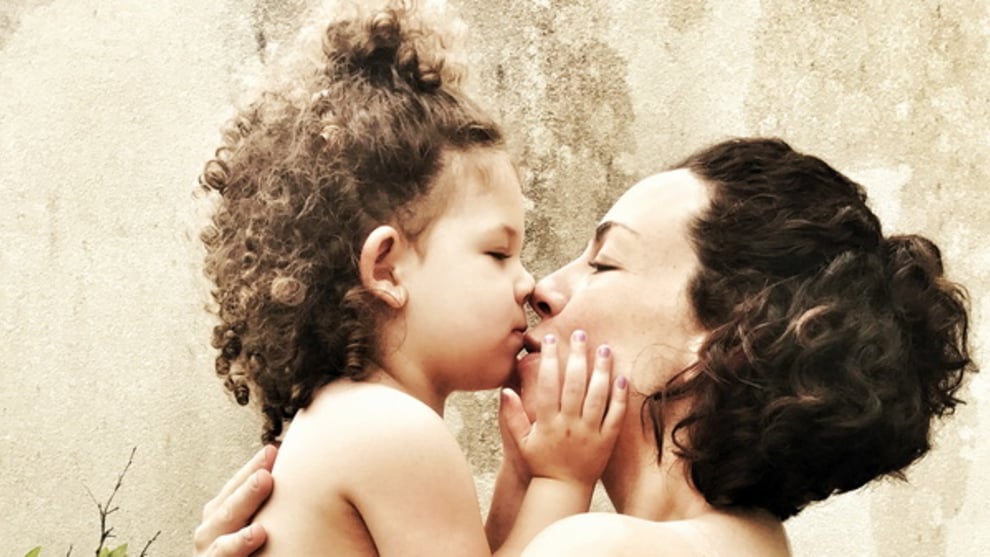 SECOND PLACE - Lauren Elise Barlow - Deja Vu
&ldquo;This photo is a documentation of my older sister on the due date of her second child. It captures a beautiful and fleeting moment of Rebecca's and Rita's bond as mother and daughter only hours before they both met Javi, their son and brother.&rdquo;
