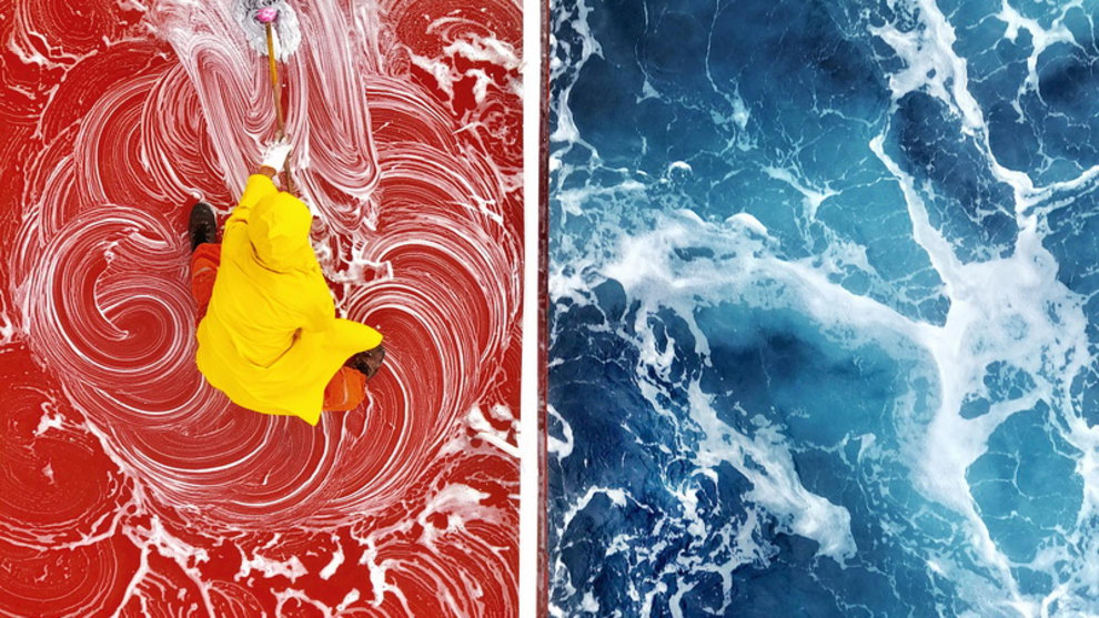 MOBILE &ndash; FIRST PLACE 2018 &ndash; Zay Yar Lin - Life in Colour.
&ldquo;A seafarer cleaning a ship red deck while a ship was sailing in the ocean. This was an aerial view of the ship red deck and whirling Blue Ocean as well as the life of a seafarer.&rdquo;