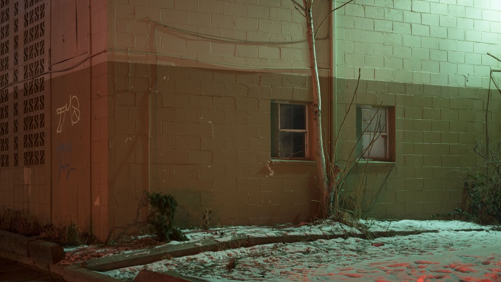 Todd Hido
Aperture

Untitled, #11669-1778. 2016.

&ldquo;This is a relatively recent image published in Intimate Distance (2016). I shot it in Denver, which is one of my go-to stomping grounds. I have lived in California for about 20 years, and
over time realized how important it is to get out of the sun and into the snow. Denver has plenty of it. There is also that grittiness that I love. This place reminds me of the apartment buildings that I used to deliver papers to on my BMX bike
as a pre-teen. My images address the theme of Crossings in the most basic manner: I bring together exact opposites
on the color wheel, red and green, warm and cool. It&rsquo;s curious how those foundational basics of color theory are at work here; opposites are attractive together.&ldquo;