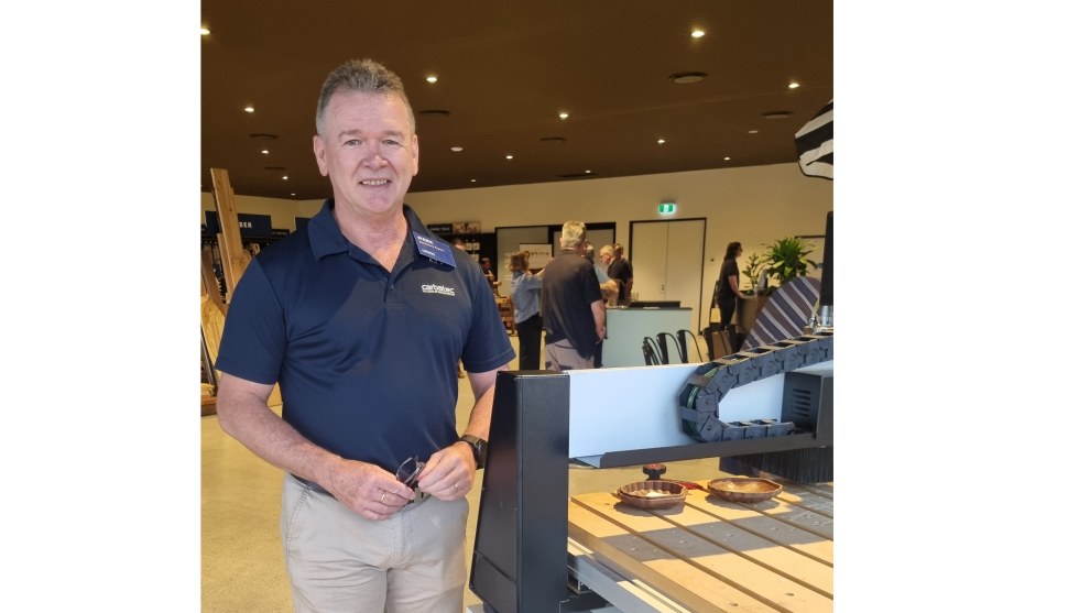 Mark Thomas, Sydney Carbatec Business Development Manager, stands with an example of the i2R CNC range which is proving popular with makers and in particular schools.