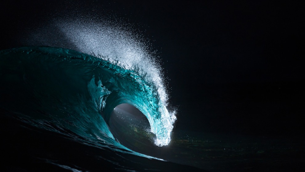 Mathew Tildesley, Nocturnal Curl. &lsquo;Nocturnal Curl&rsquo; is part of a project called &lsquo;The Nocturnal Series&rsquo;. Named not just for the hour they were taken but also the obsession which consumed me, keeping me awake at night. Surf Flash Photography is so intriguing; you never know how the results will turnout. The light might be absorbed by the water, or highlight intricate details never noticed during daylight hours. &lsquo;Nocturnal Curl&rsquo; was one of those rare instances where as soon as the shutter had clicked, I knew I had something special, although all I could see was the faint lump of a wave in the dark.