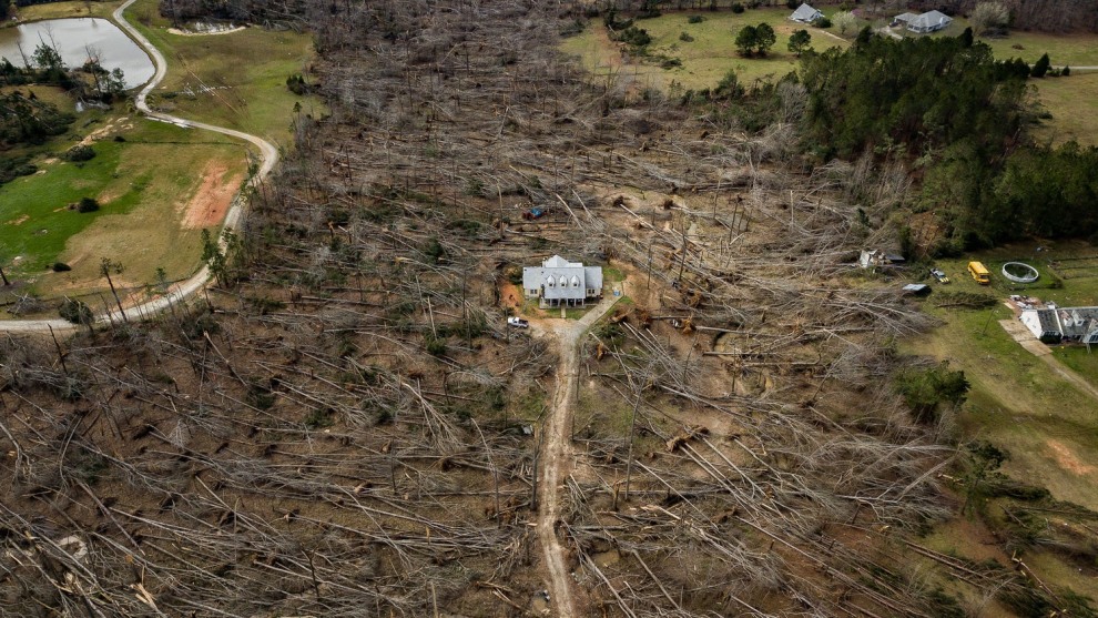 &copy; Matt Gillespie. American Experience (Finalist). Home Survives Direct Hit From Tornado. This home was in the direct line of a tornado that hit Ellerslie, Georgia. Most of the trees on the property had fallen, but the house stood with minimal damage.