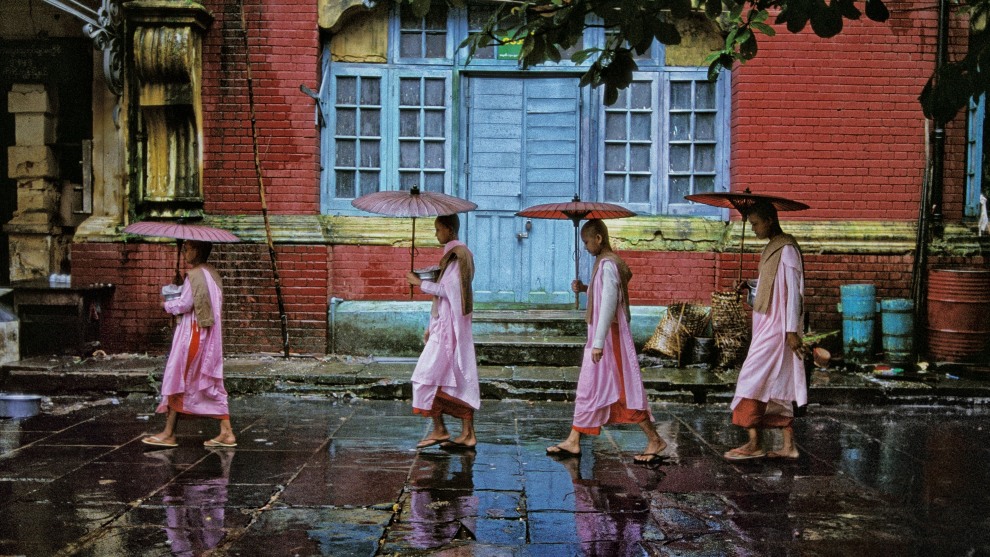 Steve McCurry
Magnum Photos

Procession of nuns. Yangon, Myanmar. 1994.

&ldquo;I asked a group of Buddhist nuns if I could follow them as   they carried their alms bowls during their rounds through the streets of Yangon, Myanmar. They gather alms and food from local people who donate in order to demonstrate their humility and connection with their Buddhist faith.&rdquo;