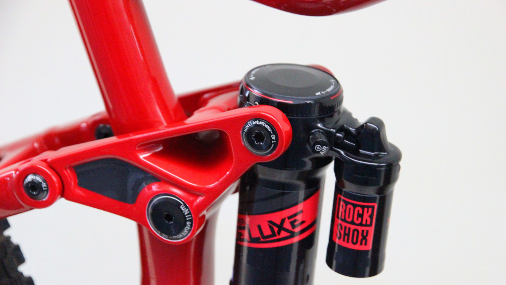 Trunnion mount shocks take up less space and in this case it allows for a lower top tube.