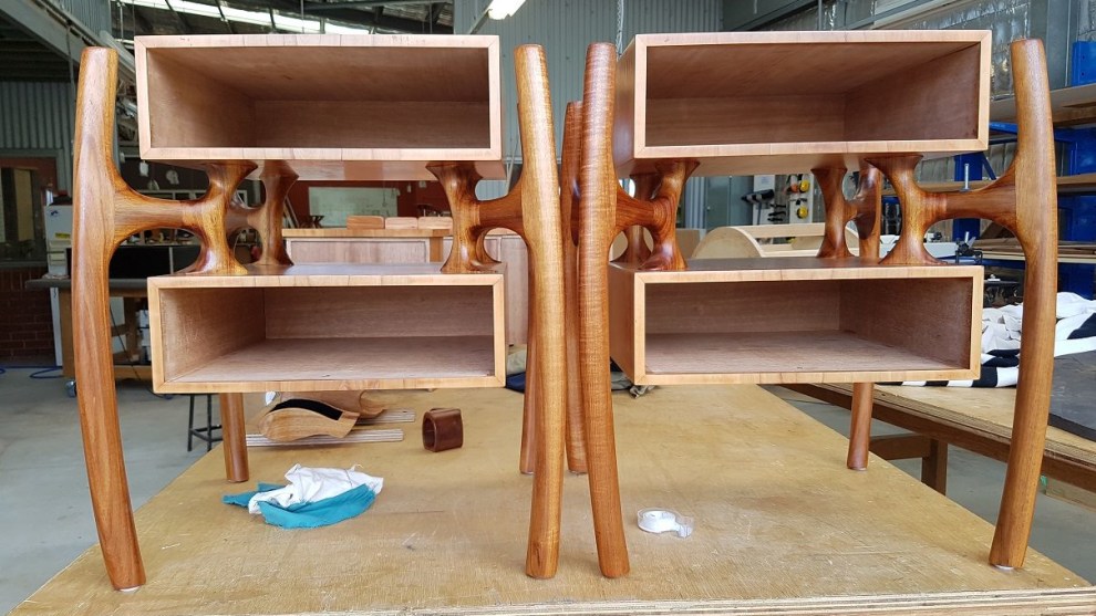 A pair of side tables in progress in the workshop, all ready for veneering.