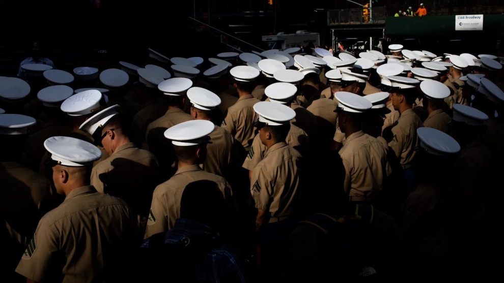Japanese photojournalist Yuki Iwamura won the 2020 Ian Parry Scholarship (Sunday Times Award for Achievement). His project was on American pride. This image shows US Marine Corps members assembled in Times Square for a photo shoot during Fleet Week. "Coming from rural Japan, where patriotism isn't so present, it's interesting to me to see people so enthusiastic about their country," Iwamura said. "But it's not all Americans. It's really divided."