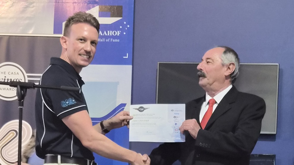 Phil Unicomb is delighted to receive the Col Pay Award for Services to GA