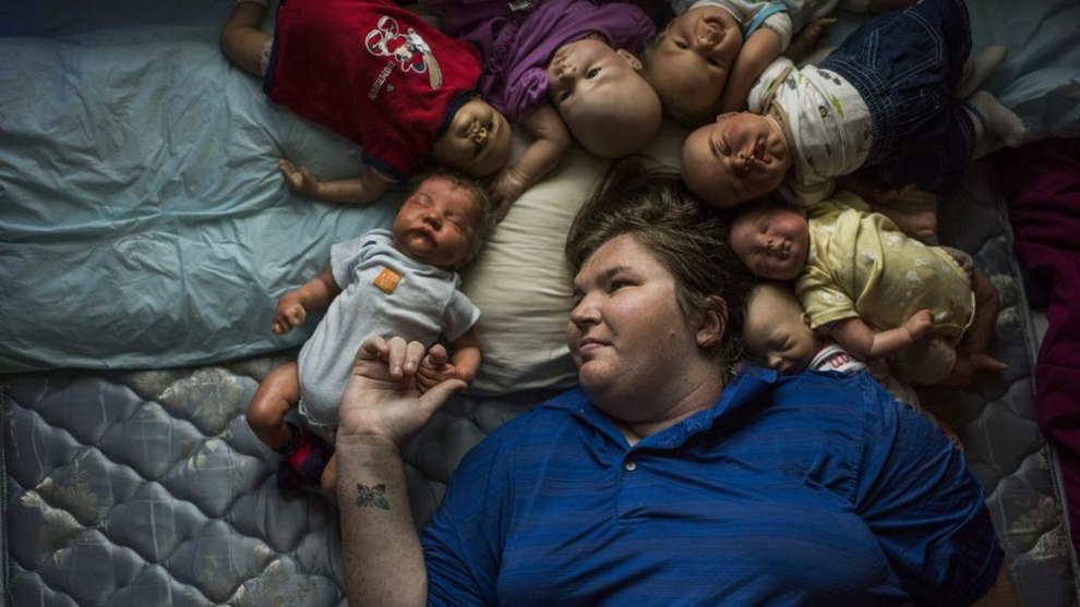 A finalist in The American Experience category &ndash; Lisa suffers from depression, anxiety, and borderline personality disorder and said that these reborn dolls are the only solution to help calm her symptoms. A reborn doll is a manufactured skin doll that has been transformed by an artist to resemble a human infant with as much realism as possible (Credit: Brittainy Newman)