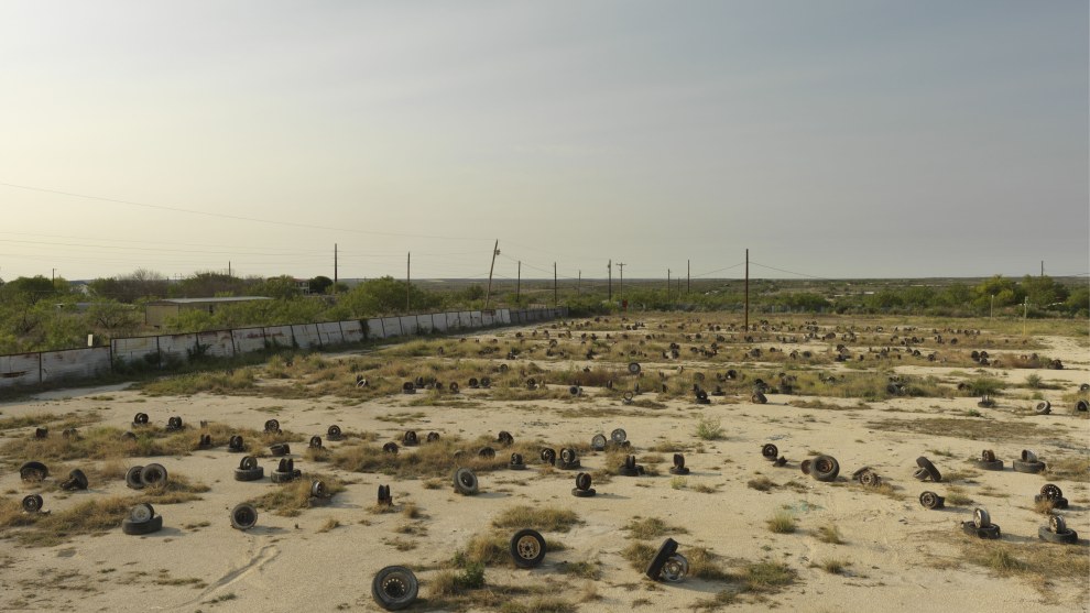 Alec Soth
Magnum Photos

Del Rio, Texas, USA. 2011.

&ldquo;A fissured, empty, almost lunar landscape&ndash;seen from a bird&rsquo;s- eye view. The camera hovers over it.&rsquo; So begins Sam Shepard&rsquo;s script for one of my all-time favorite films: Paris, Texas,
by Wim Wenders.

I thought of this scene often while photographing from the rooftop of an RV in the border town of Del Rio, Texas. I also thought of the opening lines of dialogue in Paris, Texas. &lsquo;Do you know which side of the border you&rsquo;re on?&rsquo; Looking at the otherworldly landscape from above, this question seems more metaphorical than geographic. The border I&rsquo;m most interested in crossing is the one between ordinarily life and dreams.&rdquo;