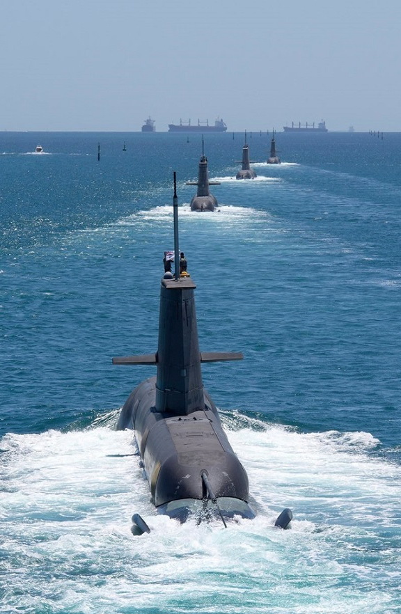 Four of Australia&rsquo;s Collins-class submarines, HMAS Collins, HMAS Farncomb, HMAS Dechaineux and HMAS Sheean underway in formation off the coast of WA.

Credit: Defence